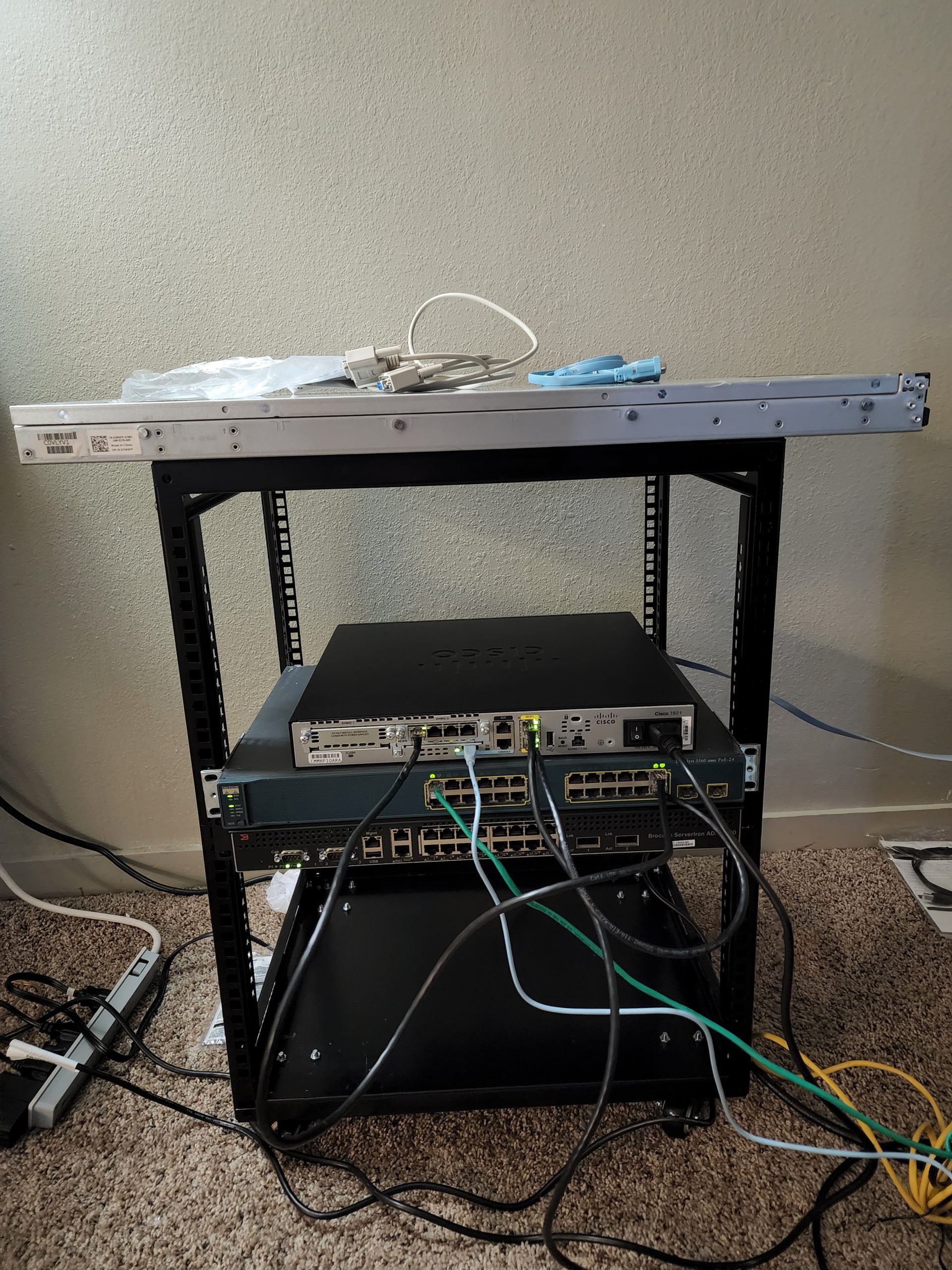 Home networking and server lab in Montana with rack-mounted Cisco and Brocade equipment